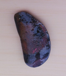 hammered and enameled copper shape